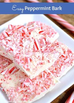 white chocolate peppermint bark on a plate with candy canes