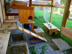 the inside of a house with several different types of bird houses and other things in it