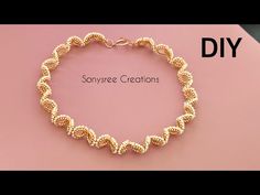 a gold bracelet that is on top of a pink surface with the words diy written below it