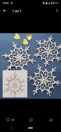 four snowflakes are shown on a blue background and one is drawn with gold foil