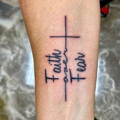 a cross with the names of jesus and mary on it is shown in black ink