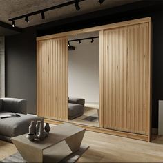 a living room filled with furniture and sliding doors