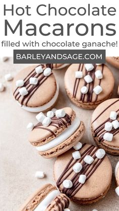 chocolate macaroons filled with chocolate ganache and marshmallows on top