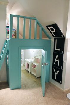 a room with a loft bed and stairs