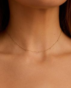 Dainty and sophisticated, yet simple enough for everyday wear, the Diamond Dot Flutter Choker features bezel set diamonds set on an adjustable solid gold chain. It's the perfect finishing touch to any outfit - we love this choker paired with longer length chain necklaces for a fully layered look. Diamond Dot Flutter Choker Necklace in 14k Solid Gold, Women's by gorjana Gold Dot Necklace, Simple Choker Necklace, Earrings Stacking, Dot Necklace, Diamond Choker, Solid Gold Chains, 14k Gold Necklace, Bezel Set Diamond, Mix Style