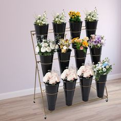 Note: please refer to the video in the 'Highlights' part below for assmbly. This movable flower display stand is carefully crafted with high-quality materials and blends modern design aesthetics with practicality, allowing the story of each bouquet to be interpreted. Its multi-layer design is staggered, that even a small space can create a rich visual hierarchy, allowing each flower to have its stage. Arlmont & Co. | Arlmont & Co. 3-layer Metal Flower Display Stand w / Wheels 43.31 H x 39.38 W x Flower Display Stand, Telephone Table, Visual Hierarchy, Design Aesthetics, Outdoor Storage Sheds, Metal Flower, Flower Display, Outdoor Heating, Layer Design