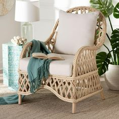 a wicker chair with a book on it