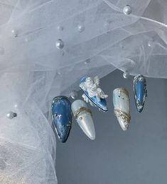 Handmade custom press on nails - Coquette Nails Blue and white chrome nails with angel charm Heaven Nails Art Designs, Angelic Nails Aesthetic, Blue Nails Charms, Light Blue Coquette Nails, Blue Charm Nails, Angelcore Nails, Blue Nails With Charms, Blue Coquette Nails