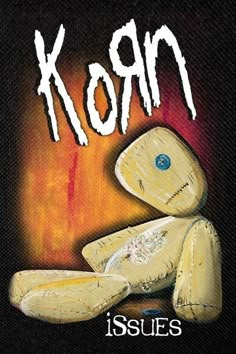 the cover for korn issues, with an image of a stuffed animal in front of it