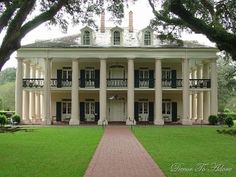 a large white house with columns and windows