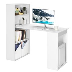 a white desk with a computer monitor and bookshelf in front of it on a white background