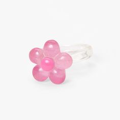 Add this cute and dainty ring to your jewelry collection! Perfect to add a pop of color, this clear resin style ring features a pretty pink flower complete with sparkly glitter. Sizes Available: 7, 8 Finish: Clear Material: Plastic - Claire's Clear Glitter Flower Resin Ring - Pink Pink Flower Promise Ring, Pink Flower-shaped Promise Ring, Adjustable Flower Ring For Party, Spring Pink Flower Ring Gift, Pink Ring For Spring Gift, Pink Ring As Spring Season Gift, Pink Rings Suitable For Spring Gift, Spring Gift Pink Ring, Spring Gift Pink Rings