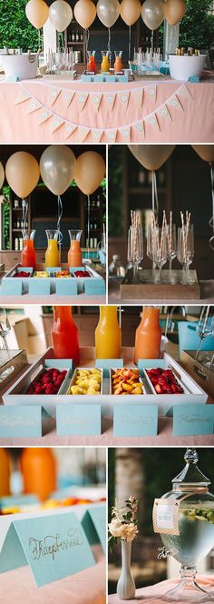 a table with many different types of food on it and balloons hanging from the ceiling