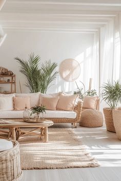 a living room filled with lots of furniture and plants