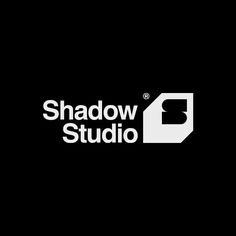 the shadow studio logo is shown on a black background with white letters and an arrow