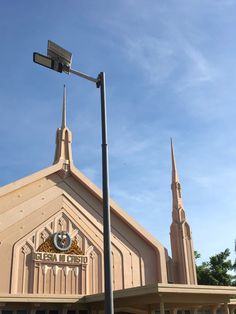 a church with a street light in front of it