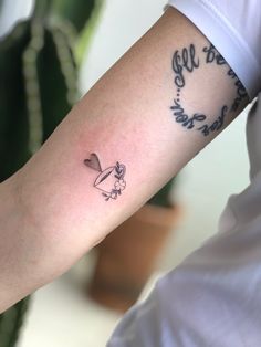 a person with a tattoo on their arm