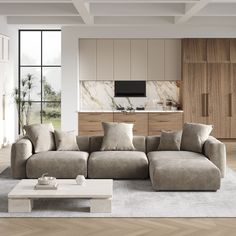 a living room filled with furniture next to a large window covered in wood paneling