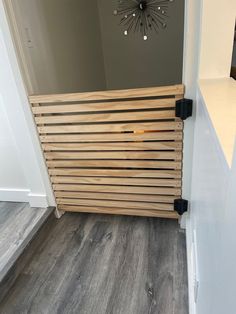 a wooden slatted wall in a hallway