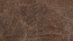 a brown marble textured surface with dark streaks