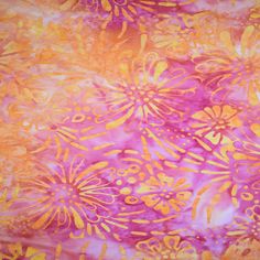 an orange, pink and yellow abstract painting with flowers on it's surface is shown