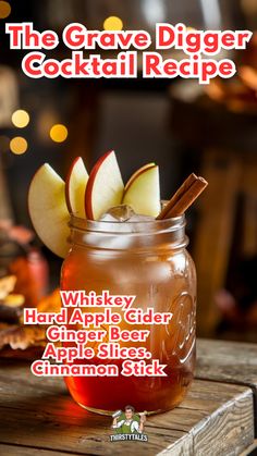 the grave digger cocktail recipe with whiskey, apple cider, apple slices and cinnamon sticks