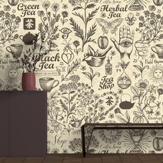 the wallpaper is decorated with flowers, plants and other things in black and white