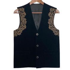 This vintage vest s in great condition! A 90s waistcoat style vest with a v neck, button front and side split hem. Luxe velvet with a damask baroque gold embroidery on front and back yoke. Very 90s witch core. no tags can suit a womens medium or large. See pics for measurements. Luxury Traditional Embroidered Vest, Elegant Black V-neck Vest, Bohemian Black Embroidered Vest, Fitted V-neck Vintage Vest, Vintage Black Vest With Button Closure, Vintage Vest, Gold Embroidery, Vest Outfits, Split Hem