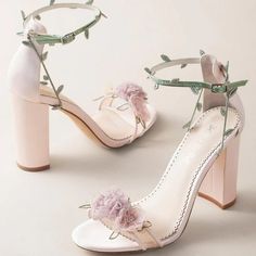 Blush block heels with pastel organza flowers and twirling embroidered vine ankle straps. The perfect flower heels for any garden soiree. New Heels Design 2023, High Heels Flowers, Whimsical Wedding Heels, Quinceanera Shoes Light Green, Weeding Shoes For Girl, Princess Core Shoes, Wedding Shoes With Flowers, Wedding Heels Floral, Fun Prom Shoes