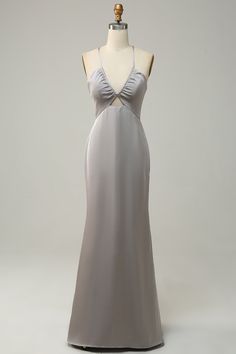 a dress on a mannequin with a white background