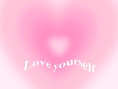 a pink heart with the words love yourself written in white on it's side