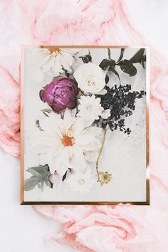 a card with pink and white flowers on it