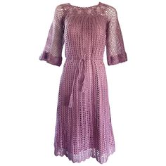 Such a beautiful early 1970s pink / rose colored hand crochet boho dress! Features a tie waist, so can fit an awesome array of sizes! Soft cotton and rayon crochet blend. Bell sleeves look fantastic on. Flower crochet detail at neck and sleeve trims. Simply slips over the head. Body is fully lined, and is very well made. This gem looks amazing on, and can easily be dressed up or down. Great with sandals, wedges or flats for day, and heels for evening. In great condition. Approximately Size Small Vintage Dresses For Sale, Bell Sleeve Mini Dress, Boho 70s, Crochet Pink, Pink Wedding Dresses, Folk Rock, Crochet Boho, History Of Fashion, Flower Crochet