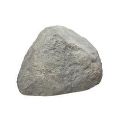 a large rock sitting on top of a white surface