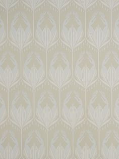 the wallpaper is beige and white with an intricate design on it's side