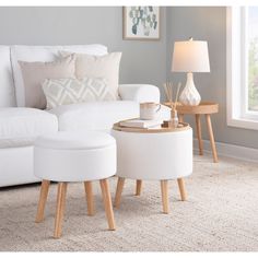 Get style and function in one with the Astrid Storage Ottoman Set. This multi-use set includes a larger ottoman with tray top lid and a matching stool with lift-off lid for extra storage. Ottoman With Tray, Contemporary Storage, Storage Ottomans, Large Ottoman, Storage Stool, Ottoman Set, Cream Fabric, Living Room Storage, Table Storage