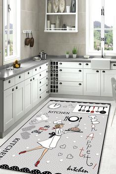 a kitchen area rug with an image of a woman on the floor in front of white cabinets