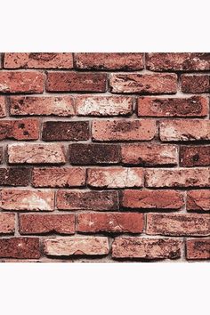 an old brick wall is shown in this image