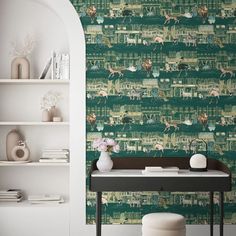 a wallpapered room with a desk, shelves and vases on top of it