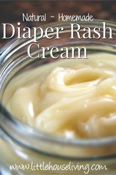 a jar filled with cream sitting on top of a table