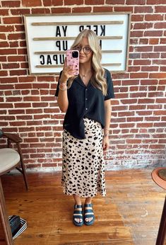 This Leopard Midi Skirt is the perfect piece to infuse your wardrobe with a touch of flirty fun! The soft and flowing fabric is both flattering and comfortable. Dress this skirt down with a graphic tee and sneakers or dress it up with a bodysuit and heels! Runs true to size Leopard Skirt With Sneakers, Curvy Teacher Outfits, Fun Teacher Outfits, Leopard Midi Skirt, Skirts With Sneakers, Spring Teacher Outfits, Sunny Season, Flowing Fabric, Leopard Skirt