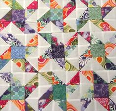 an image of a quilt made with different colors