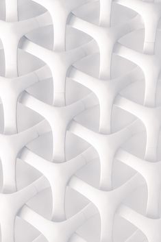 an abstract white background with wavy lines and curves in the form of intersecting structures that are interlocked into one another