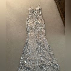 Silver Sequins, With Built In Bra, Crosses In Back For Pretty Effect. Perfect Condition, Never Worn. No Discount On Shipping White Sparkly Dress Long, Silver Hoco Dresses, Burgundy Long Dress, White Sparkly Dress, Red Floor Length Dress, Hoco Court, Silver Glitter Dress, Green Lace Maxi Dress, Orchid Corsages