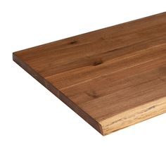 a wooden cutting board on a white background