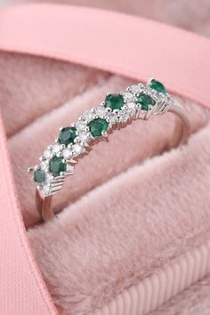 Emerald gemstone is never out of fashion. Shop this pear cut emerald ring. #emeraldring #engagementring #rings #stylishring #vintagering Emerald Cluster Ring With Diamond Accents For Wedding, Green Cluster Ring With Diamond Accents For Wedding, Green Cluster Diamond Ring For Wedding, Green Cluster Ring For Weddings, Green Cluster Diamond Wedding Ring, Emerald Cluster Ring For Wedding, Emerald Cluster Diamond Ring For Wedding, Cluster Ring For Wedding With May Birthstone, Emerald Cluster Diamond Wedding Ring