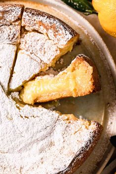 a lemon cake with powdered sugar on top