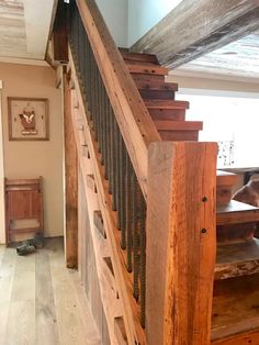 the stairs are made out of wood and metal