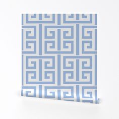 a blue and white pattern on a wall