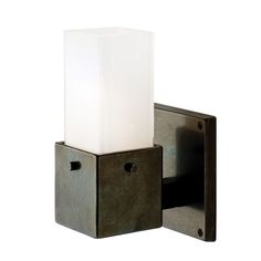 a light that is on the side of a wall mounted fixture with a square glass shade